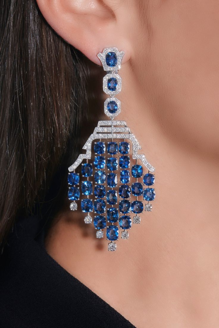 Pair-of-sapphire-and-diamond-pendent-ear-clips-_-Magnificent-Jewels-and-Noble-Jewels_-Part-II-_-2021-_-Sothebys.jpeg